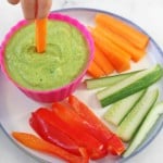 A quick and easy recipe for kid friendly Pea Hummus. Makes a super healthy snack for kids and great for lunch boxes too. | My Fussy Eater blog