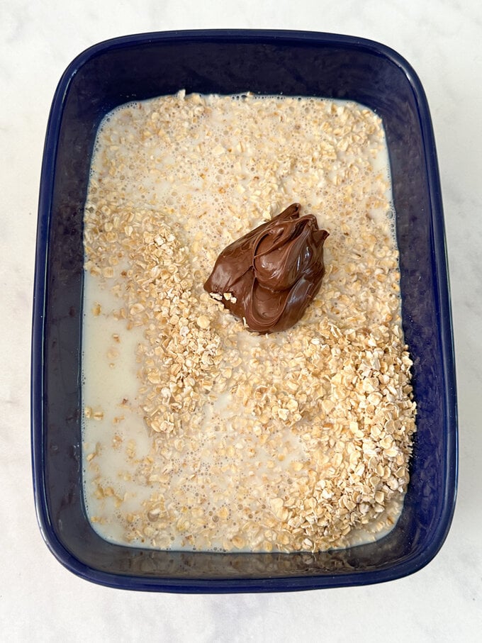 Other ingredients being added to the blue dish.