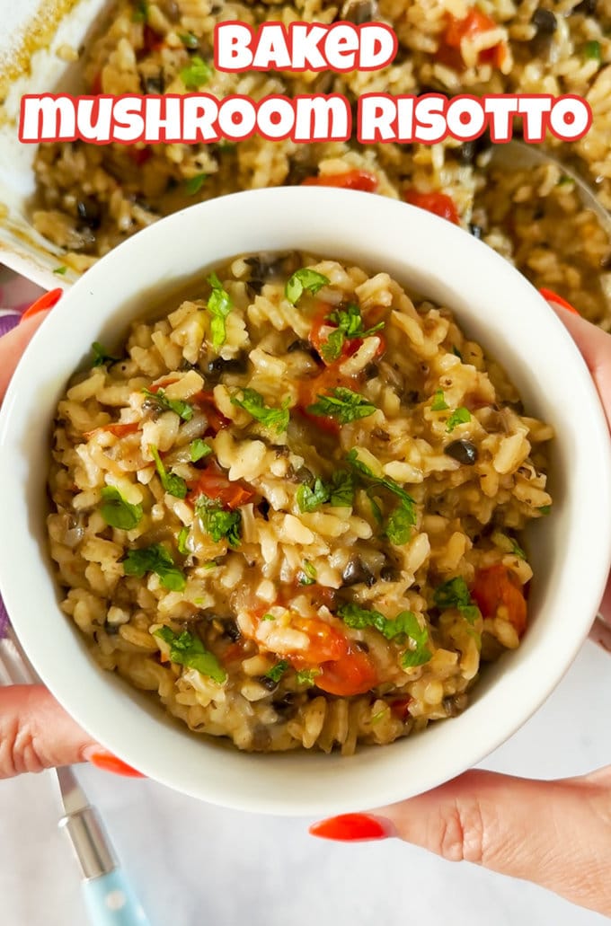 Baked mushroom risotto served in a white bowl.