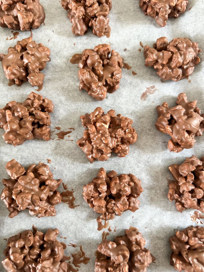 Rice Cake Clusters sitting on a bed of grease proof paper.