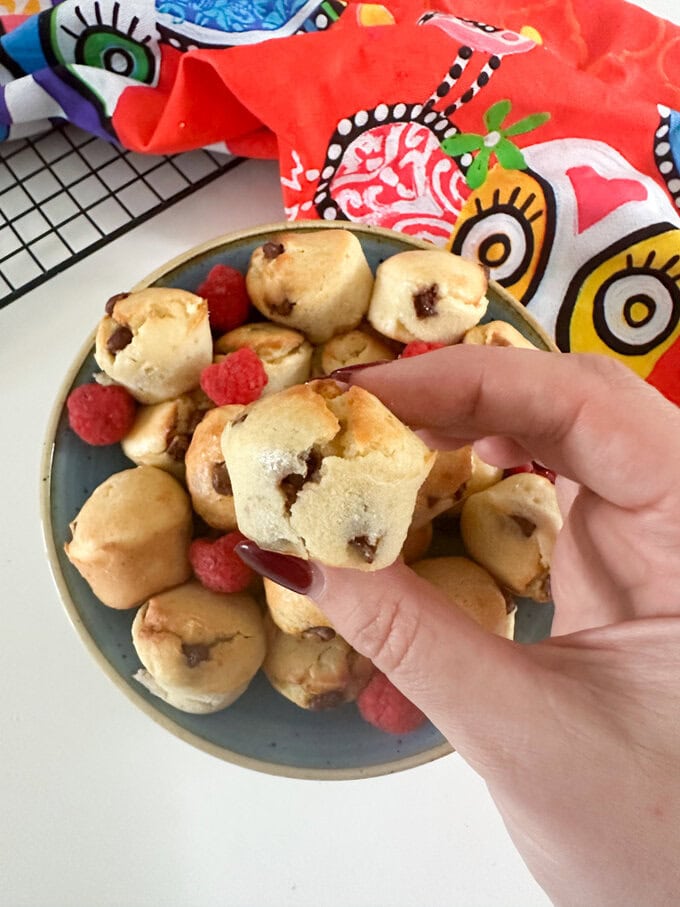 Close up of a mini chocolate chip muffin.