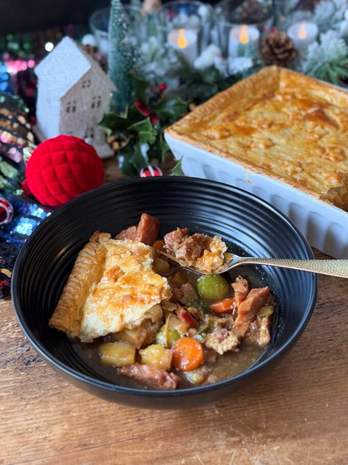 A big slice of leftover Christmas pie served in a large bowl.
