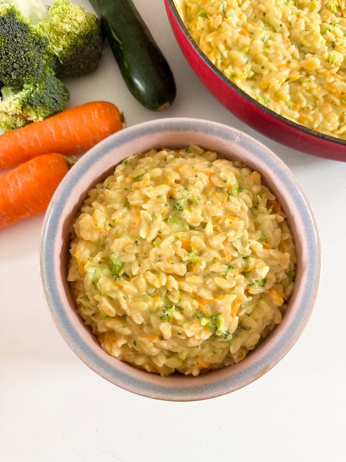 Hidden Veggie One pot orzo served in a small round bowl.