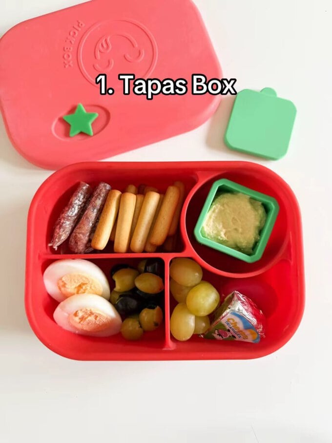 Tapas box served in a bright red Bento style kids lunch box.
