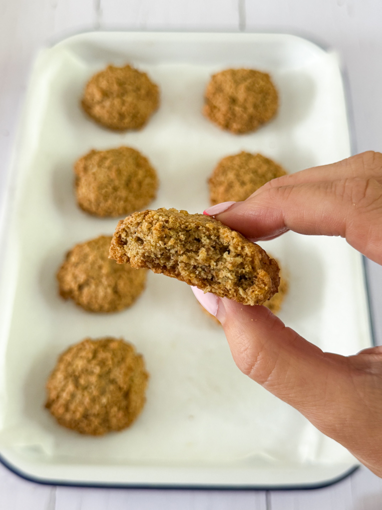 Close up photo of the inside of the cookie.Crunchy cookies, high in fibre, made from oats, wholemeal flour and flaxseed. A brilliant afternoon snack for kids or to pop into school lunchboxes